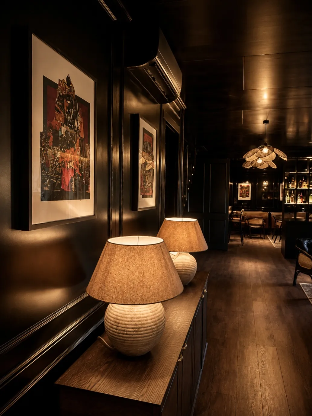 Lamps along the lacquered hallway